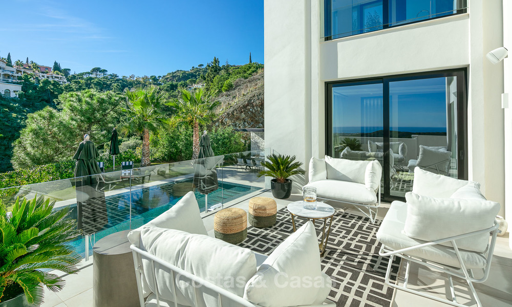Somptueuse villa entièrement rénovée avec vue magnifique sur mer à vendre à El Madroñal, Benahavis – Marbella 10088