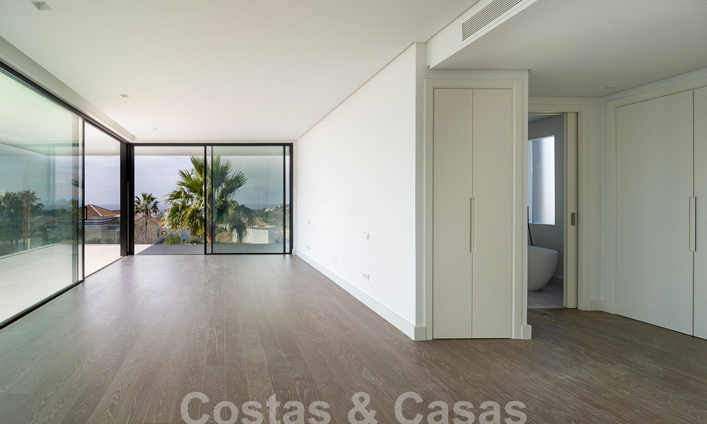 Villa de luxe moderniste à vendre avec vue magnifique sur la mer et le terrain de golf à Benahavis - Marbella 54473