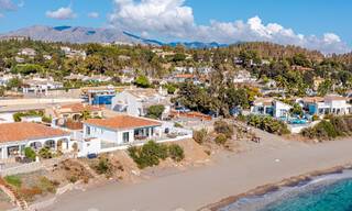Superbe villa de plage moderne et méditerranéenne à vendre avec vue frontale sur la mer, en première ligne de plage à Mijas, Costa del Sol 54556 