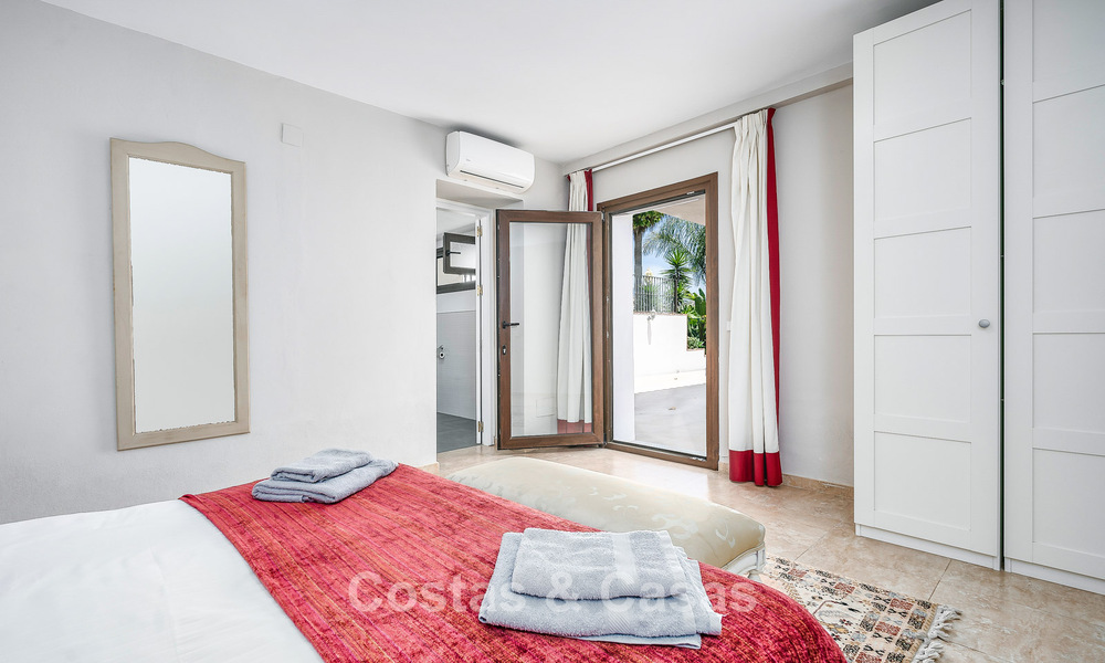 Villa de luxe de style andalou entourée de verdure sur un grand terrain à Marbella - Estepona 56346