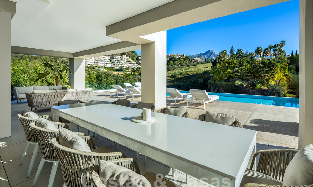Villa de luxe sophistiquée au design moderne à vendre à distance de marche du terrain de golf à Nueva Andalucia, Marbella 61347