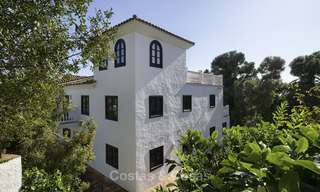 Charmante villa de style traditionnel avec vue mer et montagne à vendre à El Madroñal, Benahavis, Marbella 12628 