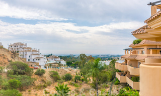 Elegante apartamento en venta recientemente renovado, con hermosas vistas abiertas, en un prestigioso complejo en Nueva Andalucía 20308 