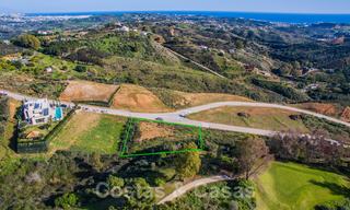 Terrain à bâtir attrayant, orienté au sud, avec une vue spectaculaire, à vendre dans un complexe de golf de classe mondiale, Mijas, Costa del Sol 24099 