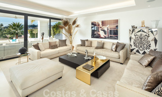 Villa de luxe élégante et contemporaine avec vue mer à vendre dans la région recherchée de Nueva Andalucia, Marbella 20896 