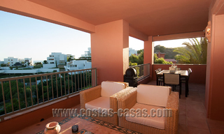 Appartements de luxe à vendre à Royal Flamingos avec vue imprenable sur le golf et la mer à Marbella - Benahavis 23587 