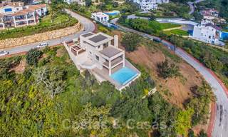 Villa moderne de luxe à vendre avec vue panoramique sur la montagne et la mer dans les collines tranquilles de l'est de Marbella 23643 