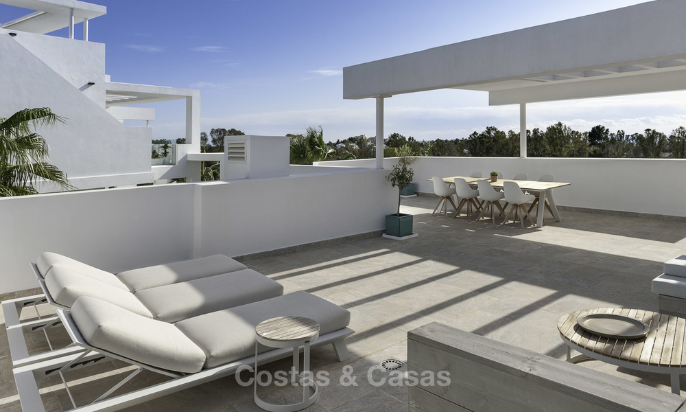 En vente à Atalaya Hills : Appartements de style moderne avec vue sur le golf et la mer à Benahavis - Marbella 24241