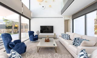 Prêt à emménager, nouvelle villa moderne de luxe à vendre, située directement sur le terrain de golf de Marbella - Benahavis 35433 