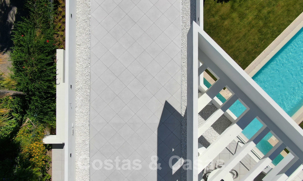 Villa moderne avec vue sur la mer à vendre sur le golf de Los Flamingos à Marbella - Benahavis. Prix réduit. 26003