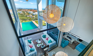 Villa moderne à vendre, en première ligne du golf avec vue panoramique sur la montagne, le golf et la mer à Benahavis - Marbella 31004 