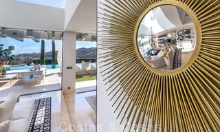 Une nouvelle villa de conception moderne en vente dans un prestigieux complexe de golf à Mijas, Costa del Sol 31895 