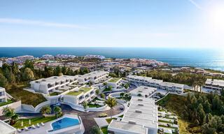 Nouvelles maisons de ville au design avant-gardiste avec vue sur la mer à vendre dans un prestigieux complexe de golf à Mijas Costa, Costa del Sol 32651 