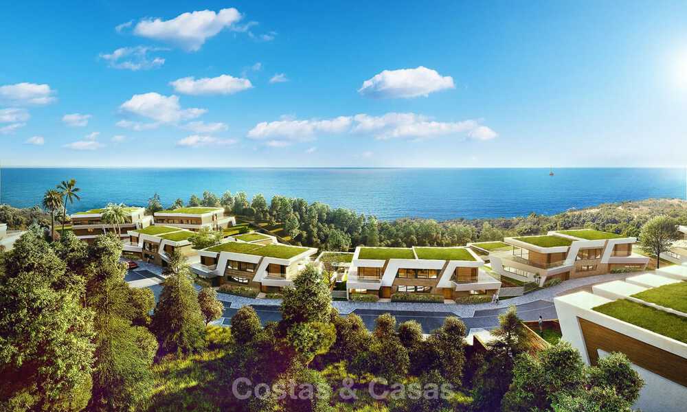 Nouvelles maisons de ville au design avant-gardiste avec vue sur la mer à vendre dans un prestigieux complexe de golf à Mijas Costa, Costa del Sol 32663