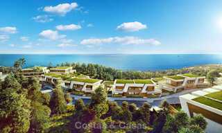 Nouvelles maisons de ville au design avant-gardiste avec vue sur la mer à vendre dans un prestigieux complexe de golf à Mijas Costa, Costa del Sol 32663 