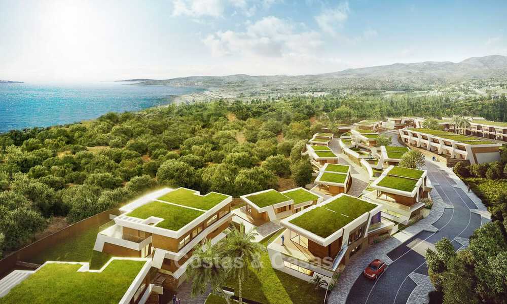 Nouvelles maisons de ville au design avant-gardiste avec vue sur la mer à vendre dans un prestigieux complexe de golf à Mijas Costa, Costa del Sol 32665