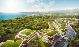 Nouvelles maisons de ville au design avant-gardiste avec vue sur la mer à vendre dans un prestigieux complexe de golf à Mijas Costa, Costa del Sol 32665 