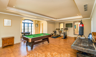 Villa charmante de style Alhambra à vendre dans l'exclusif Marbella Club Golf Resort à Benahavis, la Costa del Sol 39527 