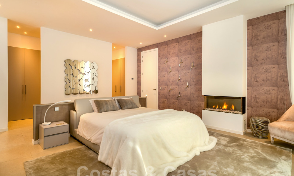 Spacieuse villa architecturale à vendre avec vue spectaculaire sur la mer dans une communauté privée de Benahavis - Marbella 52183