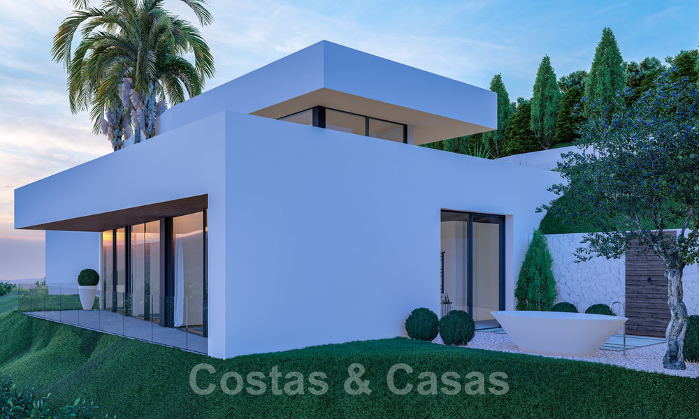 Villa contemporaine et moderne à vendre, située dans un environnement naturel, avec une vue imprenable sur la vallée et la mer, dans un complexe fermé à Benahavis - Marbella 40510