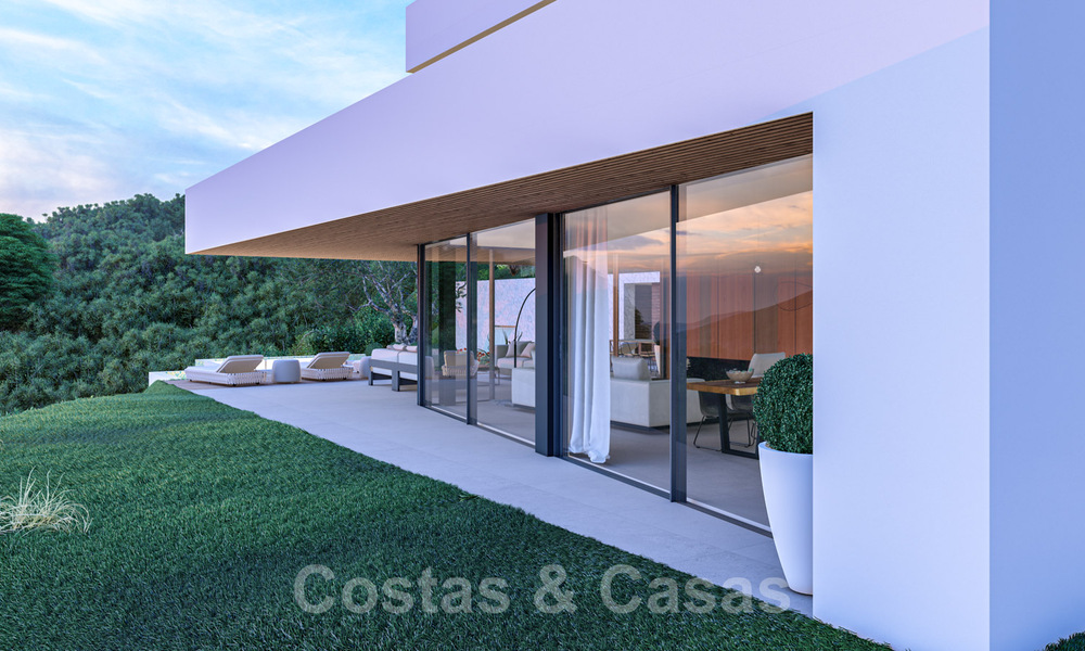 Villa contemporaine et moderne à vendre, située dans un environnement naturel, avec une vue imprenable sur la vallée et la mer, dans un complexe fermé à Benahavis - Marbella 40515