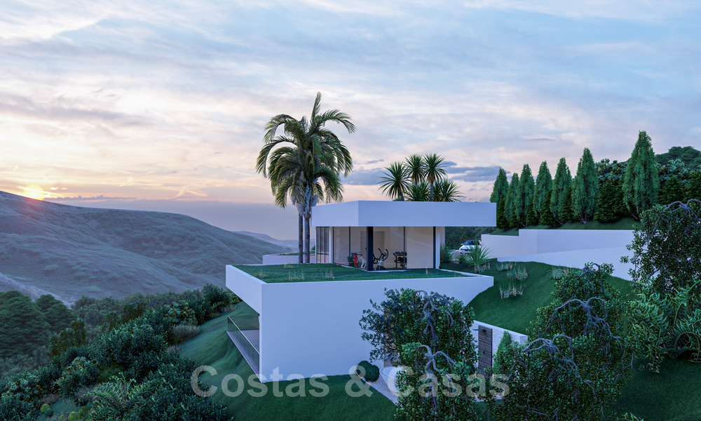 Villa contemporaine et moderne à vendre, située dans un environnement naturel, avec une vue imprenable sur la vallée et la mer, dans un complexe fermé à Benahavis - Marbella 40516