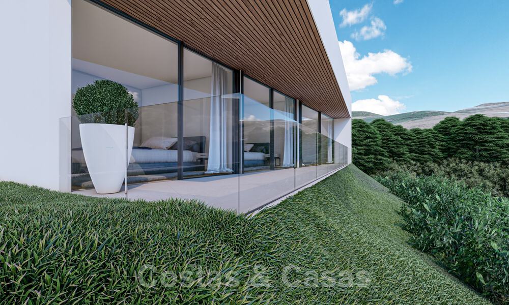 Villa contemporaine et moderne à vendre, située dans un environnement naturel, avec une vue imprenable sur la vallée et la mer, dans un complexe fermé à Benahavis - Marbella 40518