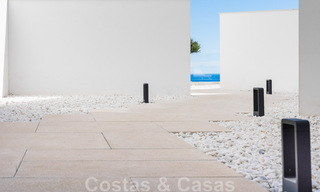 Appartement de jardin moderne et de haute qualité à vendre avec 3 chambres et des vues panoramiques sur la mer au cœur de Nueva Andalucia à Marbella 42834 