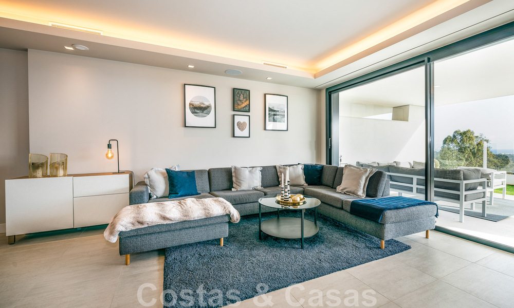Appartement de jardin moderne et de haute qualité à vendre avec 3 chambres et des vues panoramiques sur la mer au cœur de Nueva Andalucia à Marbella 42856