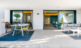 Appartement de jardin moderne et de haute qualité à vendre avec 3 chambres et des vues panoramiques sur la mer au cœur de Nueva Andalucia à Marbella 42869 