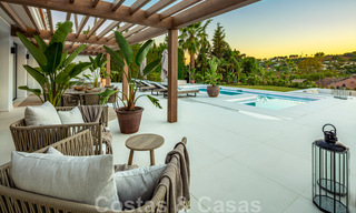 Villa andalouse contemporaine de luxe à vendre avec de nombreuses commodités de luxe, entourée de terrains de golf à Nueva Andalucia, Marbella 44382 