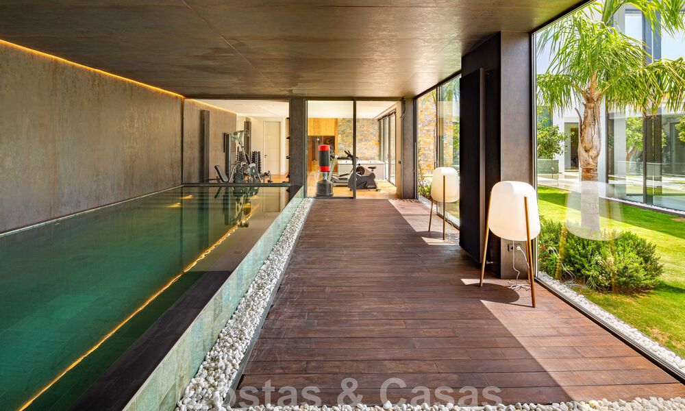 Phénoménale villa contemporaine de luxe à vendre, au bord du terrain de golf avec vue sur la mer dans un complexe de golf à Marbella - Benahavis 43980
