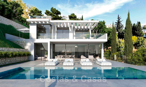 Nouvelle villa de conception moderniste à vendre avec une vue phénoménale sur la mer, à distance de marche de la plage de Benalmadena, Costa del Sol 44580