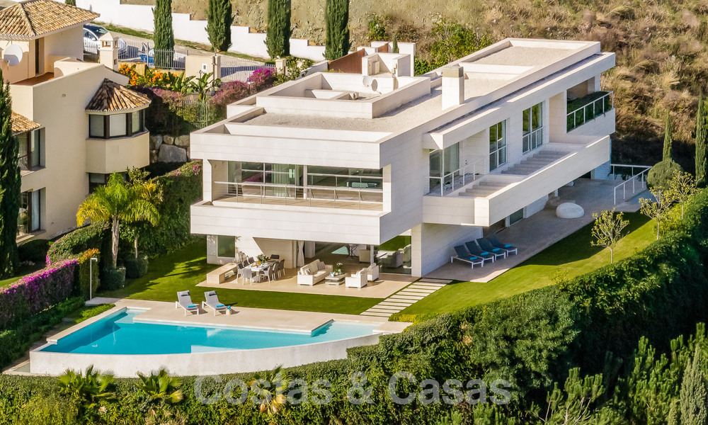 Villa de luxe en première ligne de golf, de style moderne et élégant, avec vue imprenable sur le golf et la mer, à vendre à Los Flamingos Golf resort à Marbella - Benahavis 49026