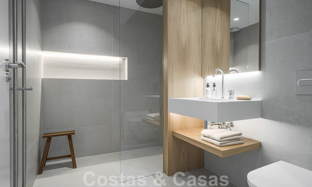 2 appartements exclusifs à vendre avec terrasse spacieuse, piscine privée et vue sur la montagne de La Concha à Nueva Andalucia, Marbella 50111