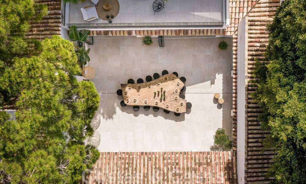 Charmante villa espagnole de luxe à vendre, entourée d'une beauté naturelle et bordant la plage des dunes à Marbella 49691