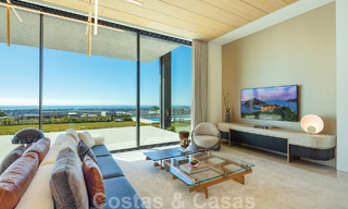 Vente d'une villa de conception architecturale, prête à être emménagée, avec vue sur la mer, dans un prestigieux quartier résidentiel protégé, sur les collines de La Quinta, à Benahavis - Marbella 49254 