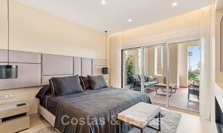 Appartement spacieux et élégant à vendre dans un complexe fermé sur une plage en front de mer avec vue sur la mer, sur le Nouveau Golden Mile de Marbella - Estepona 51307 