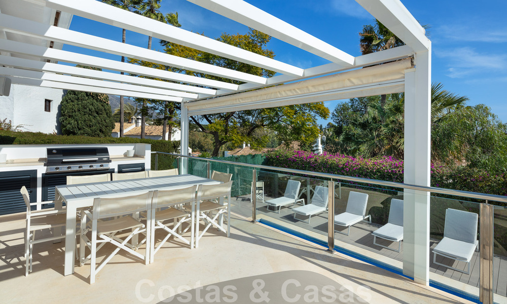 Villa de luxe espagnole à vendre avec une architecture méditerranéenne contemporaine située au cœur de la vallée du golf de Nueva Andalucia à Marbella 51228