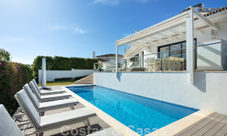 Villa de luxe espagnole à vendre avec une architecture méditerranéenne contemporaine située au cœur de la vallée du golf de Nueva Andalucia à Marbella 51230 