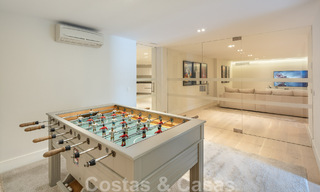 Villa de luxe espagnole à vendre avec une architecture méditerranéenne contemporaine située au cœur de la vallée du golf de Nueva Andalucia à Marbella 51232 