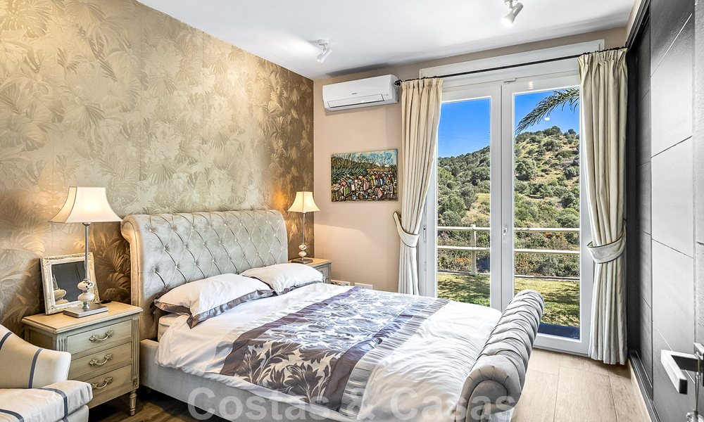 Villa traditionnelle de luxe à vendre avec vue imprenable à la frontière de Marbella et Mijas 51729