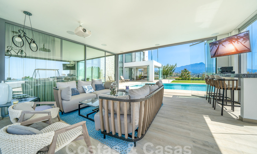 Villa moderne de luxe à vendre avec vue imprenable sur la mer dans un quartier exclusif de Benahavis - Marbella 53353