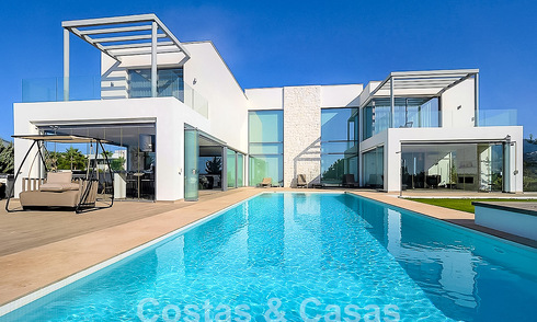 Villa moderne de luxe à vendre avec vue imprenable sur la mer dans un quartier exclusif de Benahavis - Marbella 53358