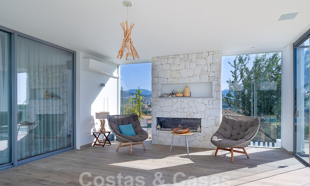 Villa moderne de luxe à vendre avec vue imprenable sur la mer dans un quartier exclusif de Benahavis - Marbella 53359