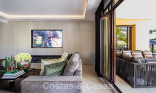 Appartement de luxe de 4 chambres à vendre dans un complexe exclusif de deuxième ligne de plage à Puerto Banus, Marbella 52103 
