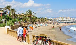 Appartement de luxe de 4 chambres à vendre dans un complexe exclusif de deuxième ligne de plage à Puerto Banus, Marbella 52143 