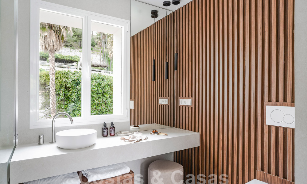 Appartement rénové de qualité à vendre avec vue sur les terrains de golf de La Quinta à Benahavis - Marbella 54364