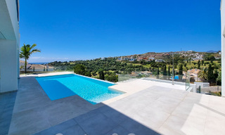 Villa de luxe moderniste à vendre avec vue magnifique sur la mer et le terrain de golf à Benahavis - Marbella 54468 