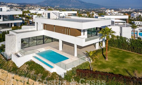 Villa de luxe moderniste à vendre avec vue magnifique sur la mer et le terrain de golf à Benahavis - Marbella 54469